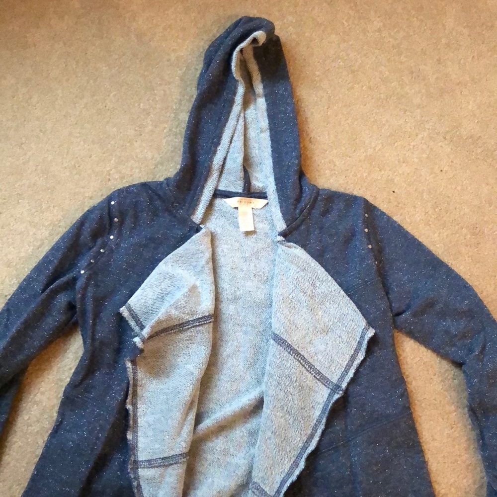 Blue sparkly cardigan.